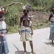 Mpondo women carrying hoes